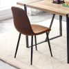 A set of 4 modern medieval style restaurant cushioned side chairs, equipped with soft cushions and black metal legs, suitable for kitchens, lounges, a